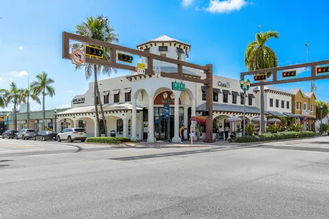 a view of a building with retail shops