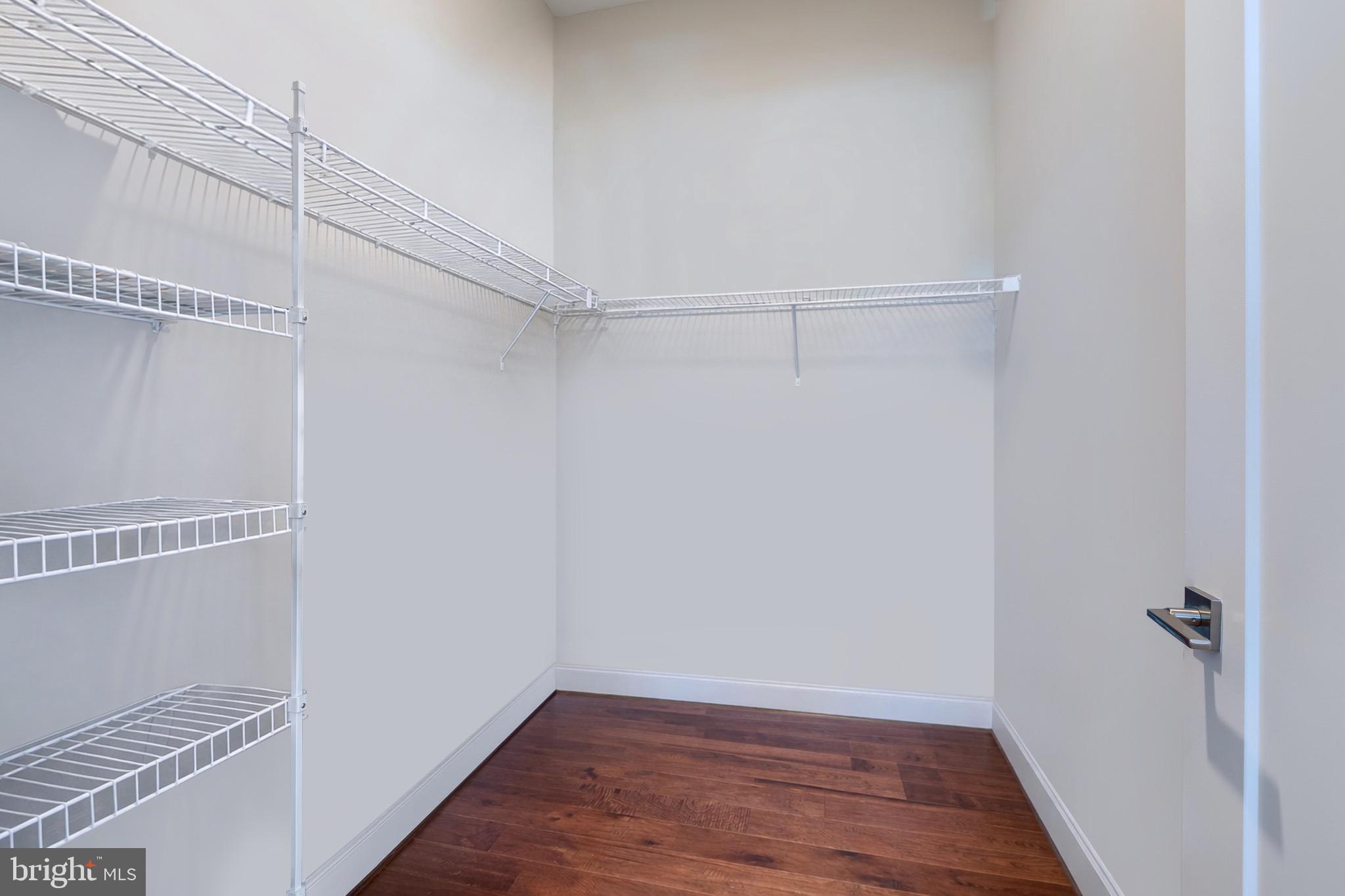 2 Stationmaster Street Southeast, Unit 202 Leesburg, VA 20175 - Photo 27 of 29 a view of a room with wooden floor