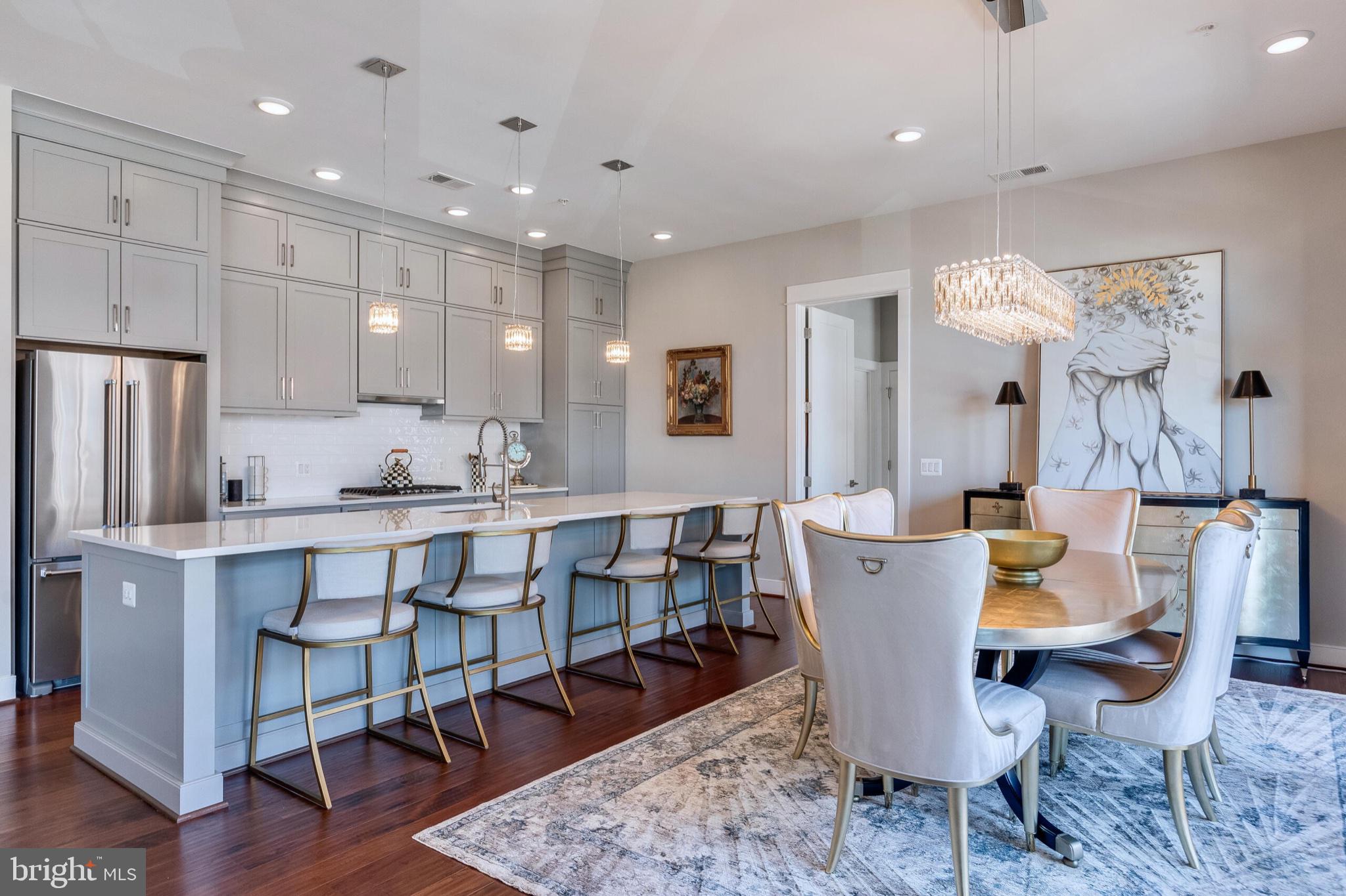 2 Stationmaster Street Southeast, Unit 202 Leesburg, VA 20175 - Photo 9 of 29 a view of a dining room with furniture