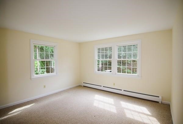180 Tyngsboro Road, Unit 55D Chelmsford, MA 01863 - Photo 4 of 20 an empty room with a window