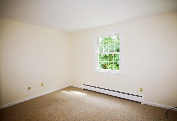 180 Tyngsboro Road, Unit 55D Chelmsford, MA 01863 - Photo 5 of 20 an empty room with a window