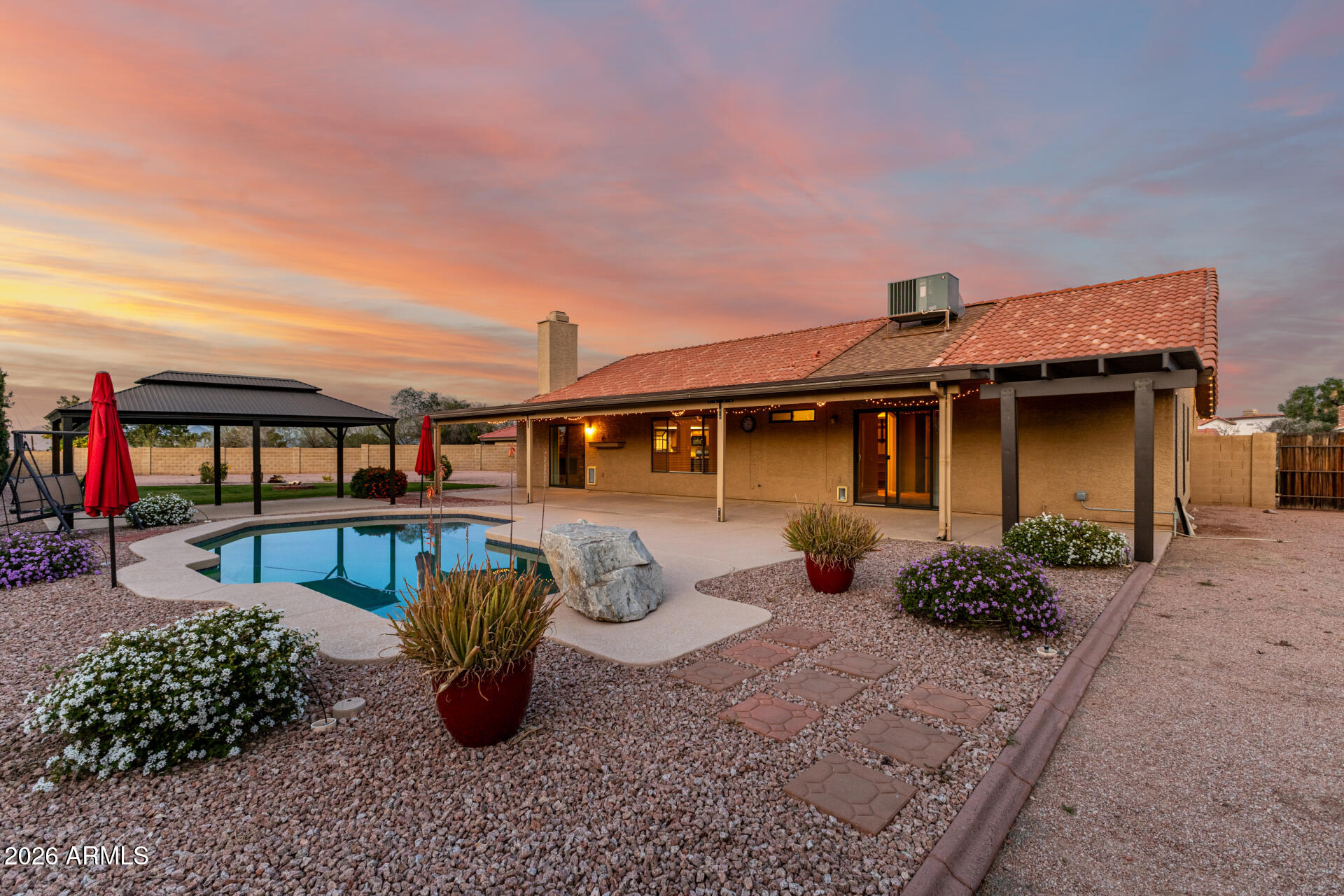 1522 N Spring Mesa, AZ 85203 - Photo 35 of 63 a front view of a house with patio