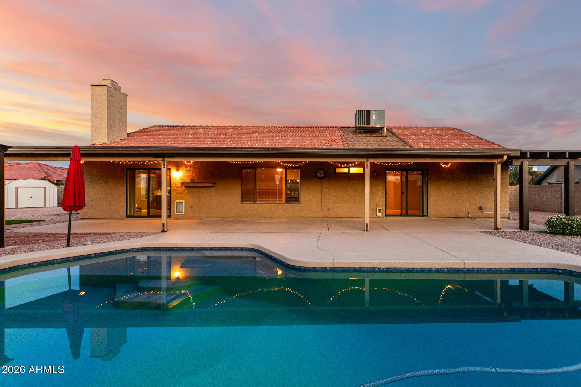 1522 N Spring Mesa, AZ 85203 - Photo 36 of 63 a front view of a house with a yard