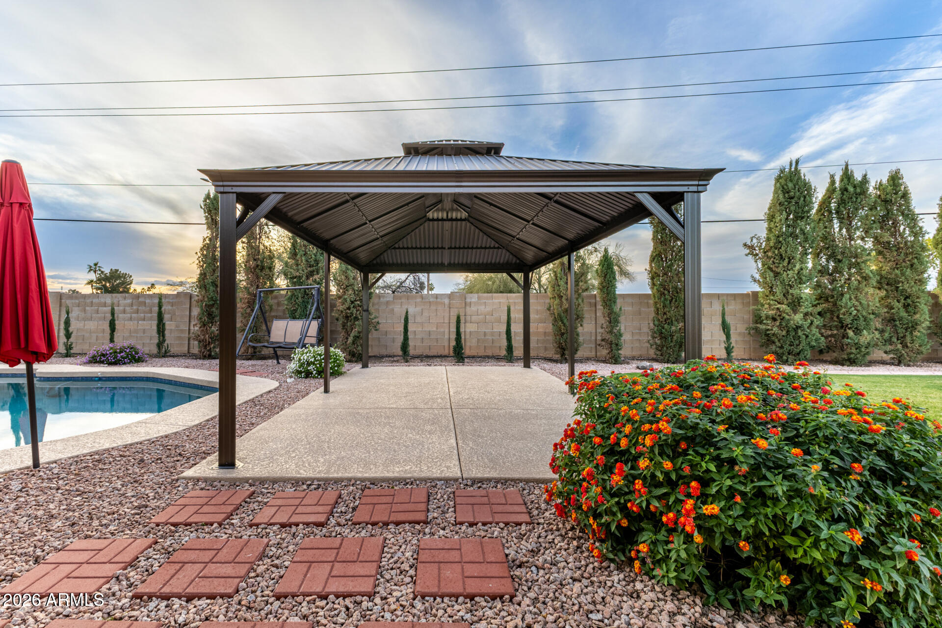 1522 N Spring Mesa, AZ 85203 - Photo 37 of 63 a couple of flower sitting in front of buildings