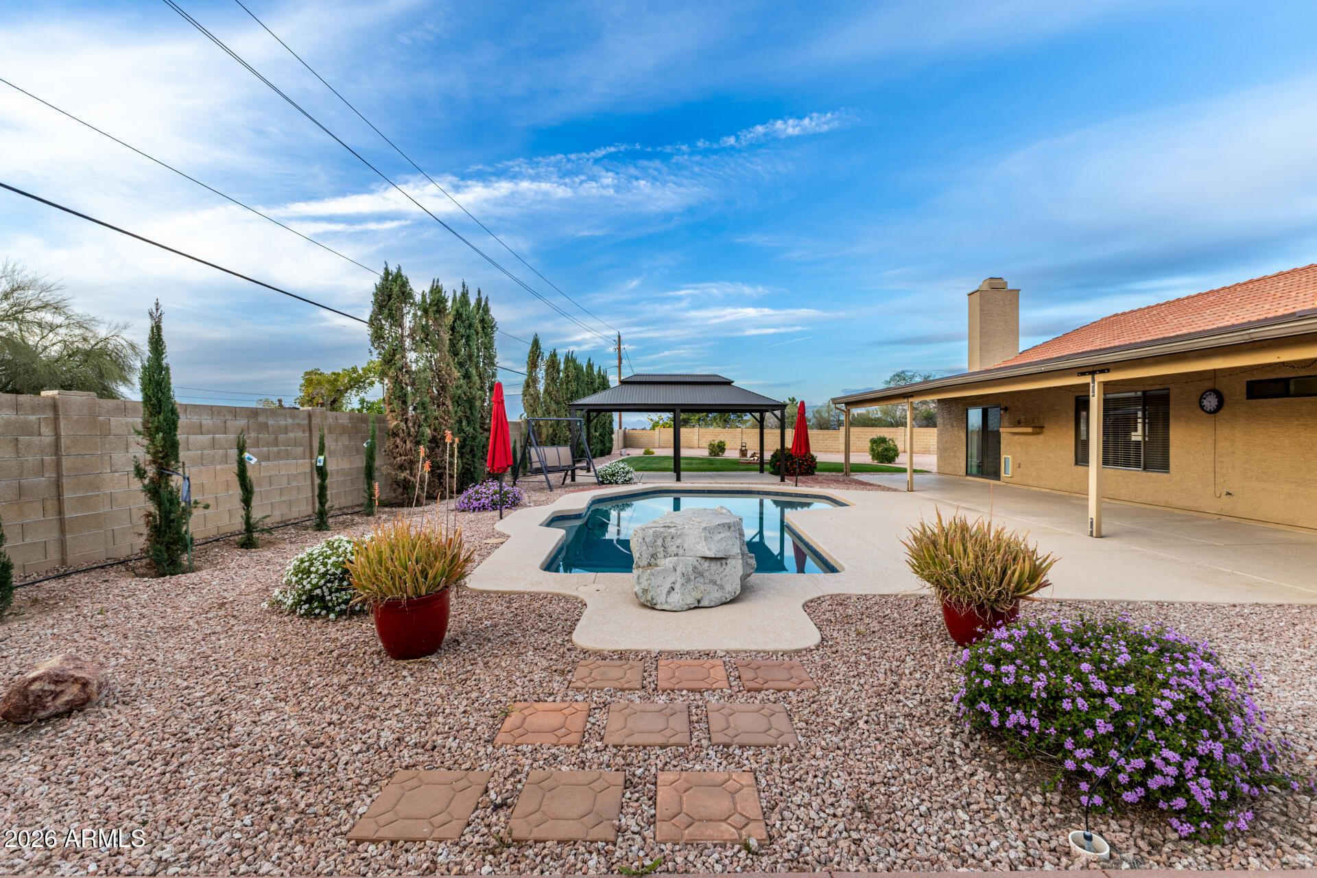 1522 N Spring Mesa, AZ 85203 - Photo 44 of 63 a view of a chairs and table in the patio