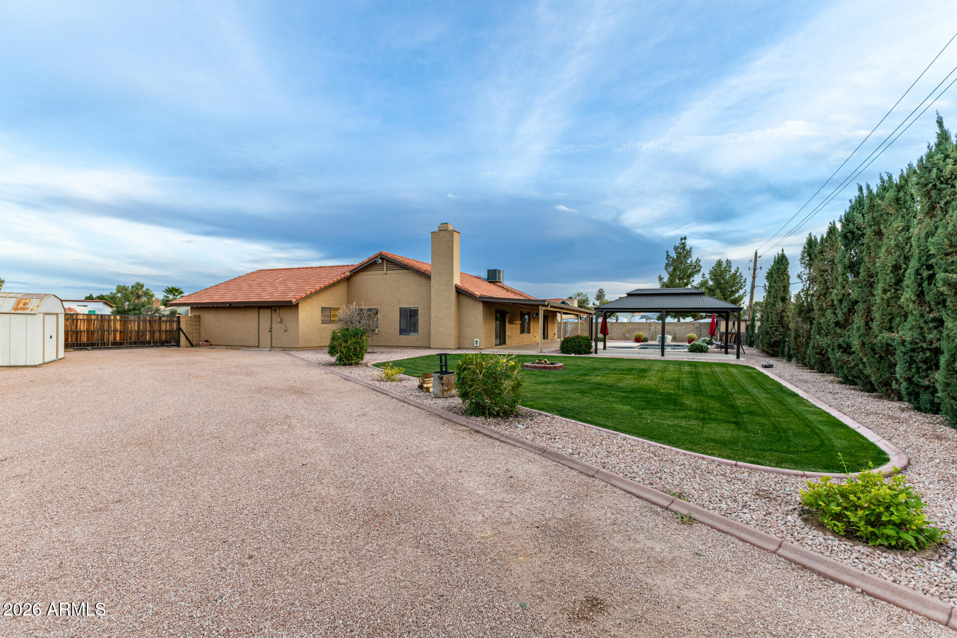 1522 N Spring Mesa, AZ 85203 - Photo 49 of 63 a view of a street with a houses