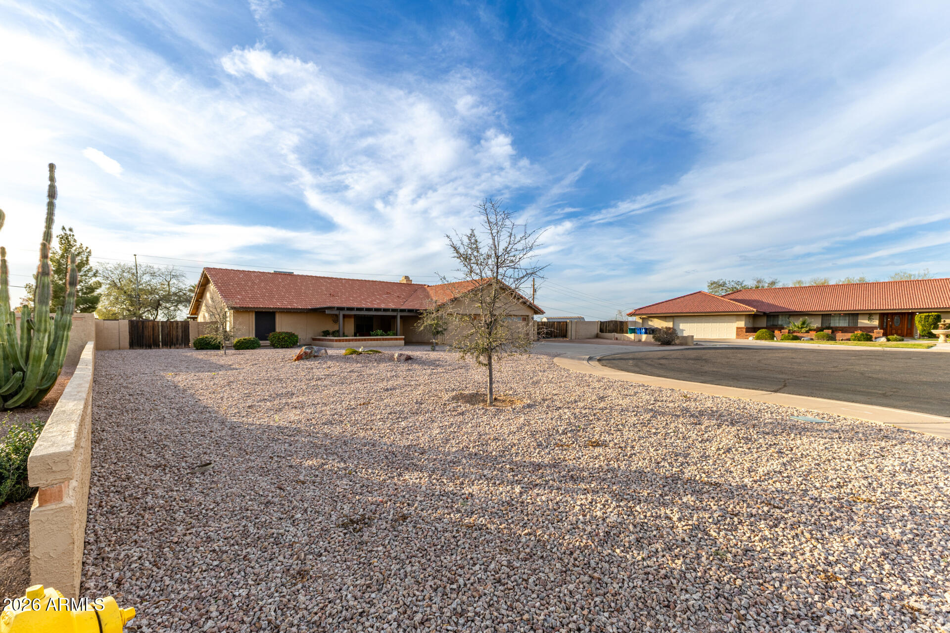 1522 N Spring Mesa, AZ 85203 - Photo 61 of 63 a white house with a yard in front of it