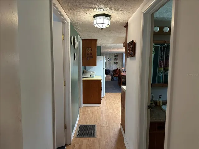 a bedroom with a bed and dresser
