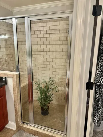 a view of a glass door and a window