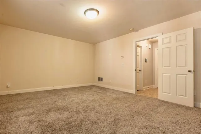 an empty room with an entryway