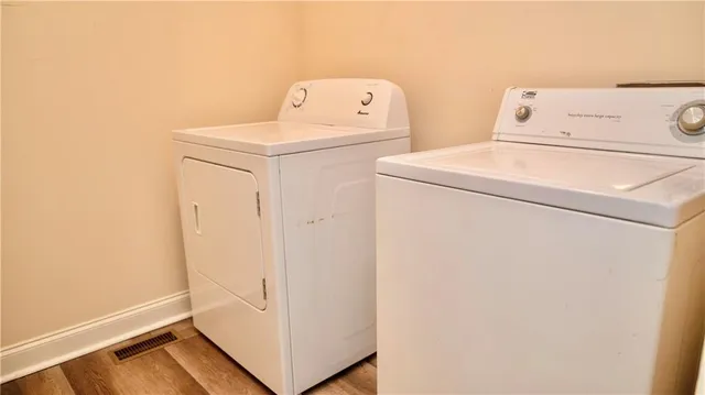 a utility room with dryer and washer