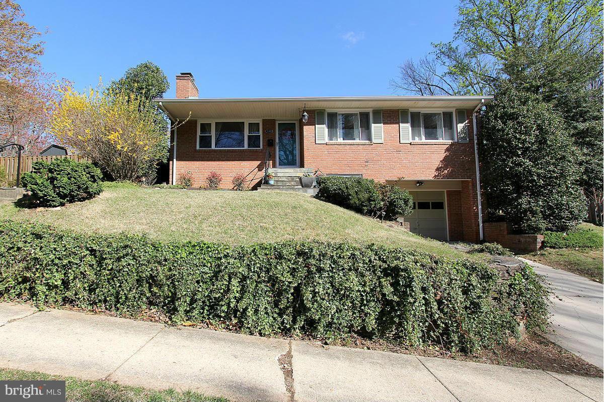109 Belton Road Silver Spring, MD 20901 - Photo 1 of 30 a front view of a house with a yard