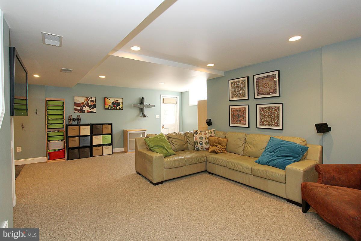 109 Belton Road Silver Spring, MD 20901 - Photo 19 of 30 a living room with furniture and a window