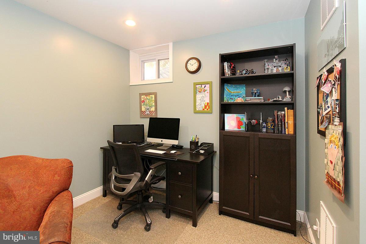 109 Belton Road Silver Spring, MD 20901 - Photo 20 of 30 a view of a workspace with furniture