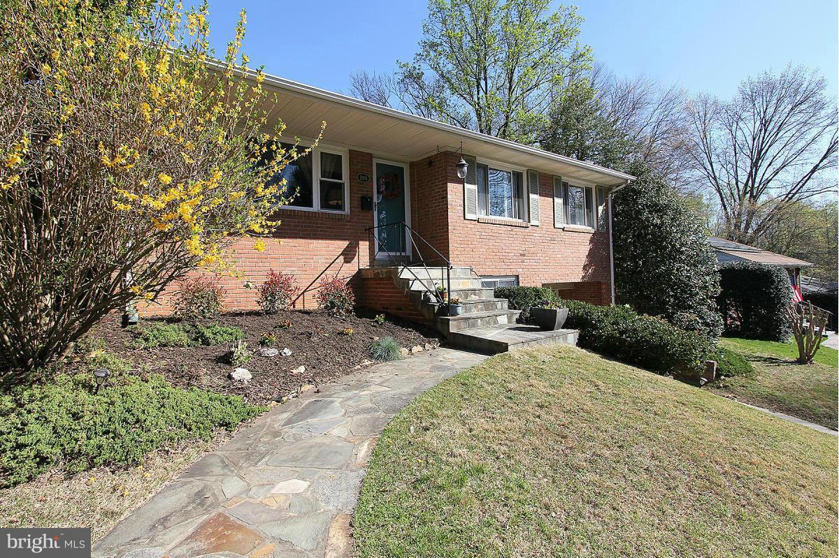 109 Belton Road Silver Spring, MD 20901 - Photo 3 of 30 a front view of a house with a yard
