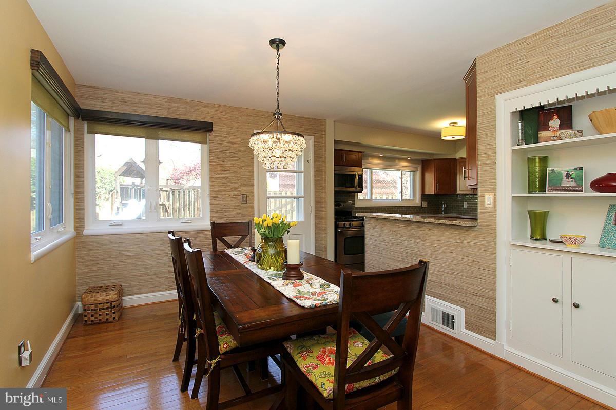 109 Belton Road Silver Spring, MD 20901 - Photo 9 of 30 a view of a dining room with furniture window and wooden floor