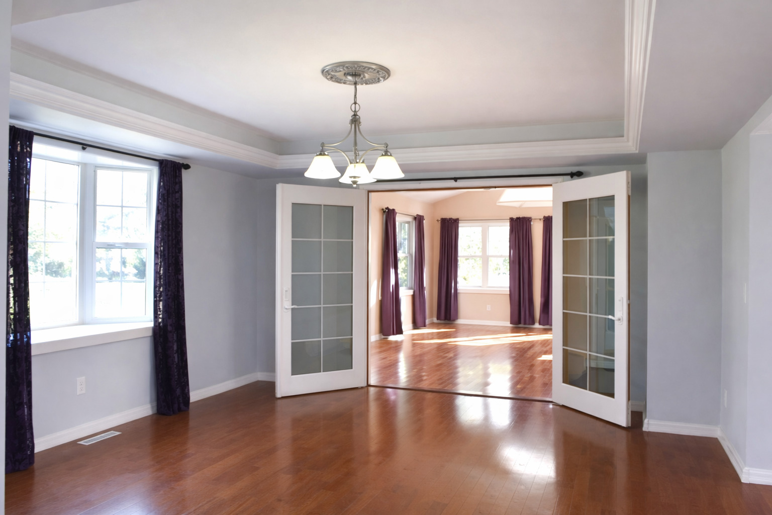 2912 Woodlawn Road Sterling, IL 61081 - Photo 27 of 48 a view of an empty room with wooden floor and a window
