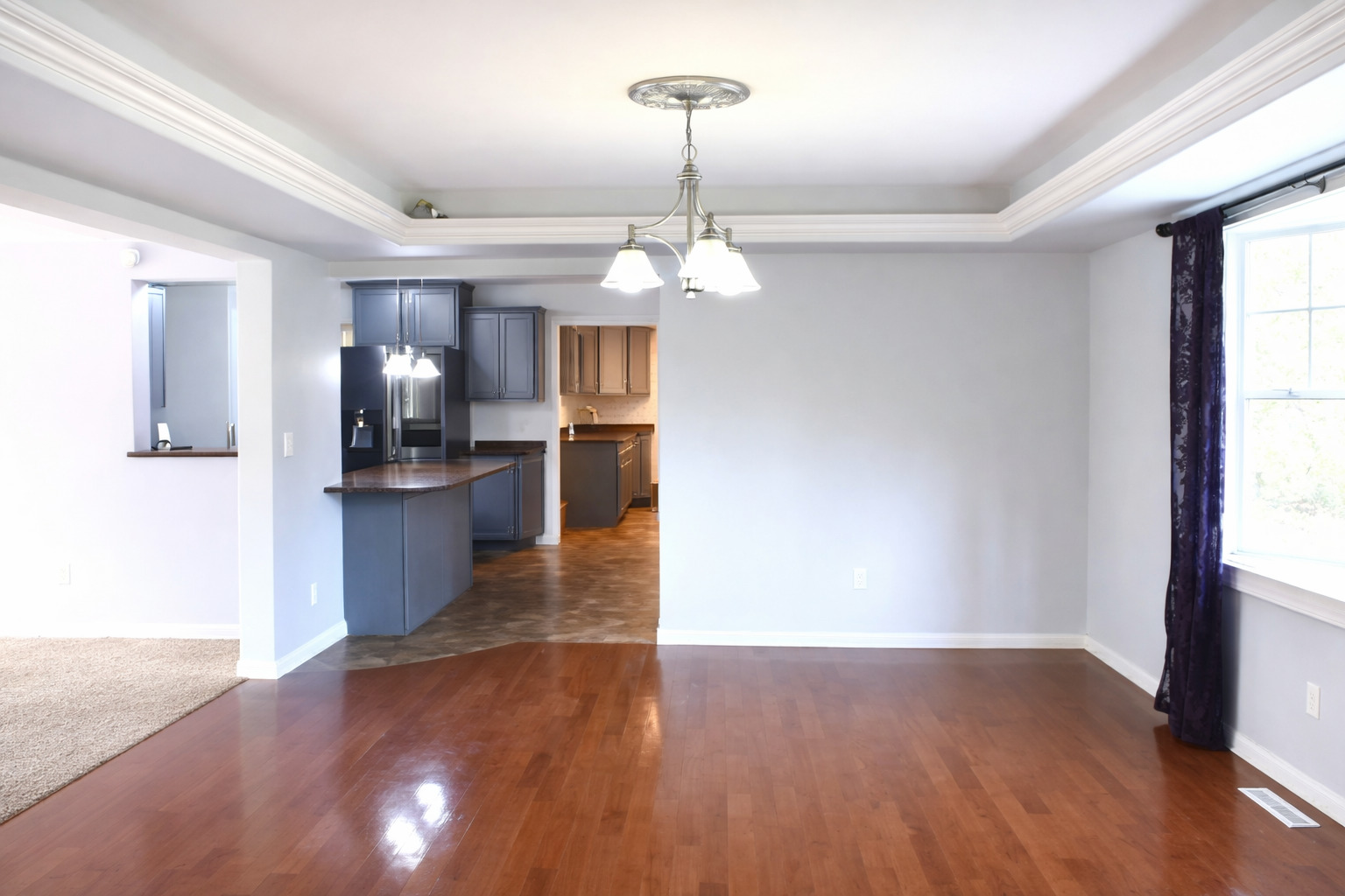 2912 Woodlawn Road Sterling, IL 61081 - Photo 30 of 48 a view of a kitchen with a sink wooden floor and a window