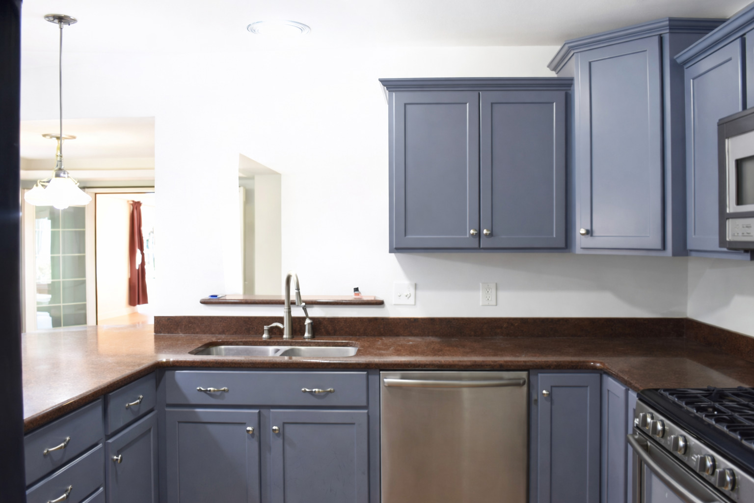 2912 Woodlawn Road Sterling, IL 61081 - Photo 33 of 48 a kitchen with stainless steel appliances granite countertop a sink stove and cabinets