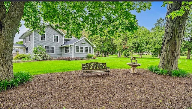 2912 Woodlawn Road Sterling, IL 61081 - Photo 4 of 48 a front view of a house with a yard and green space