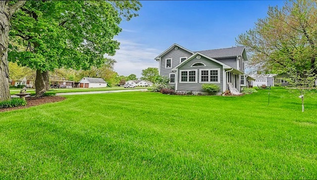 2912 Woodlawn Road Sterling, IL 61081 - Photo 5 of 48 a view of a house with a big yard and large trees