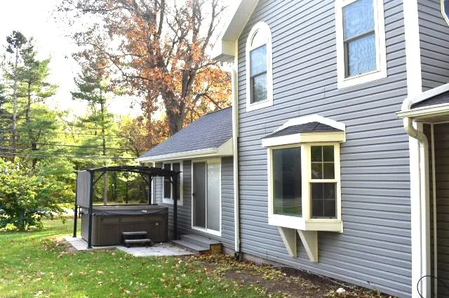 front view of a house with a yard