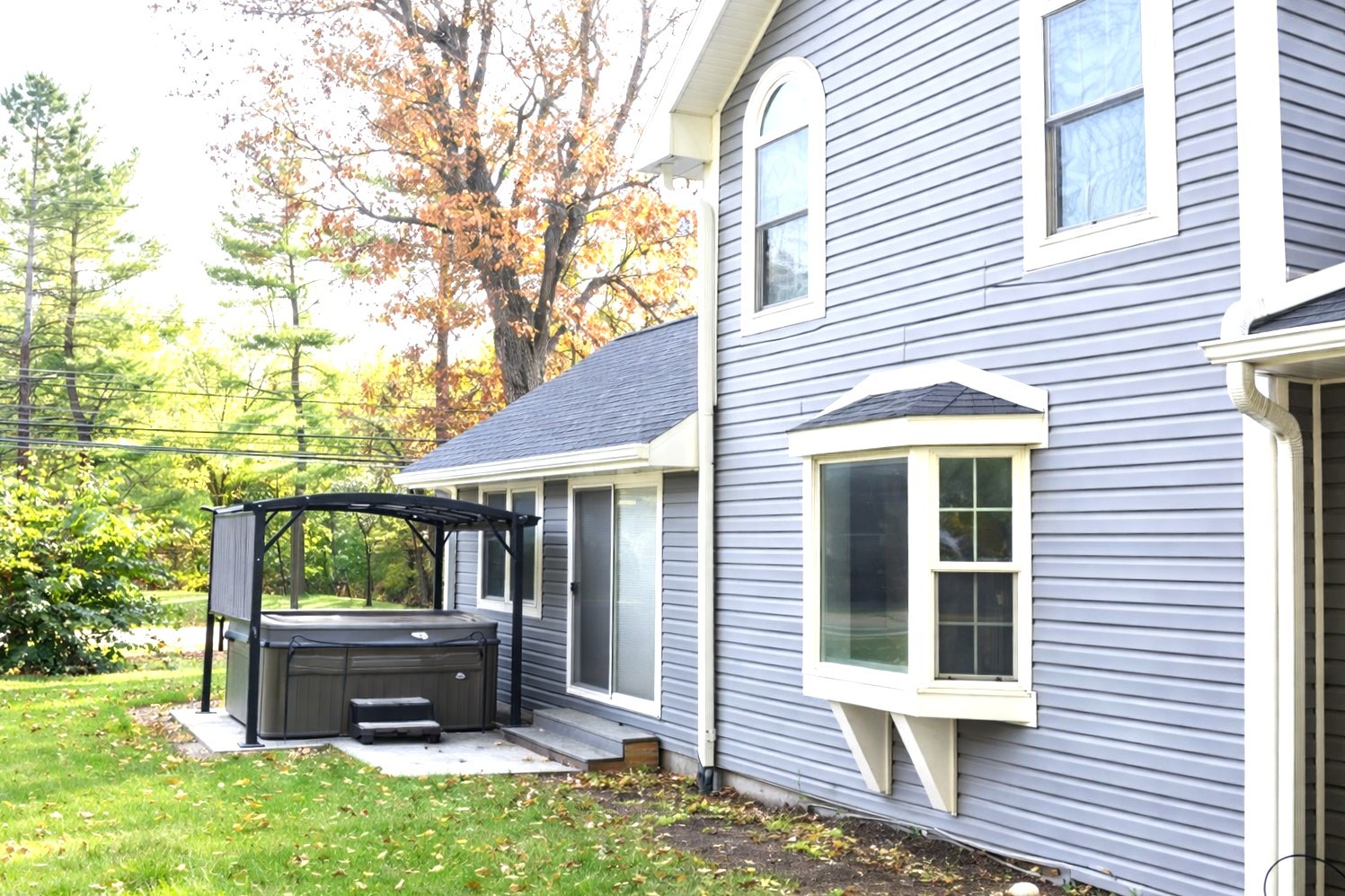 2912 Woodlawn Road Sterling, IL 61081 - Photo 7 of 48 a view of house with backyard space and deck