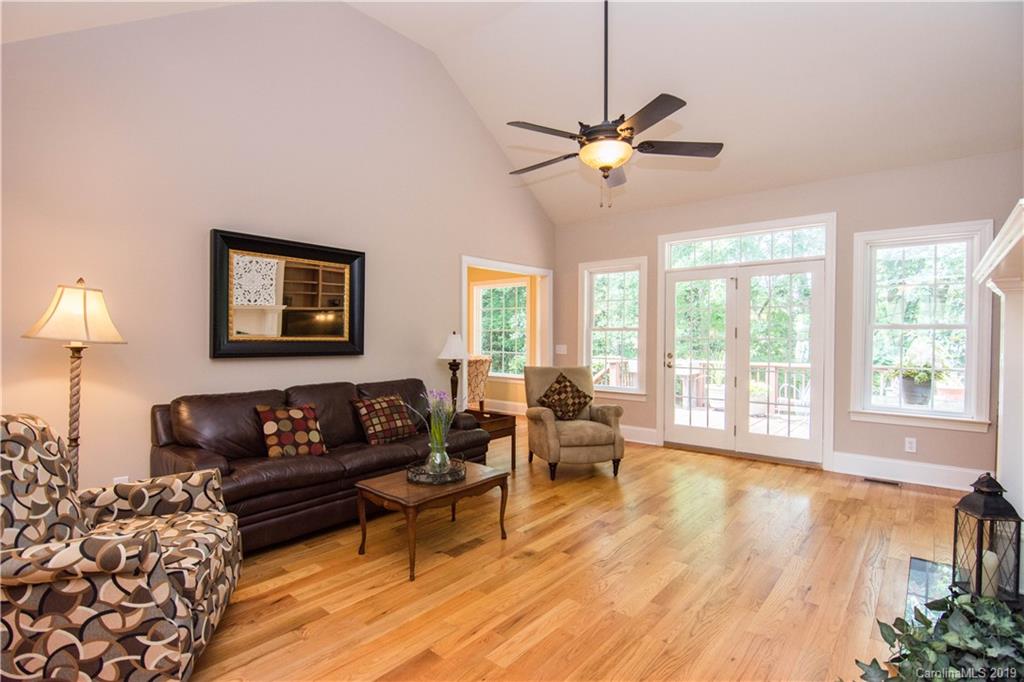 6695 Fox Ridge Circle Davidson, NC 28036 - Photo 14 of 42 a living room with furniture and a large window