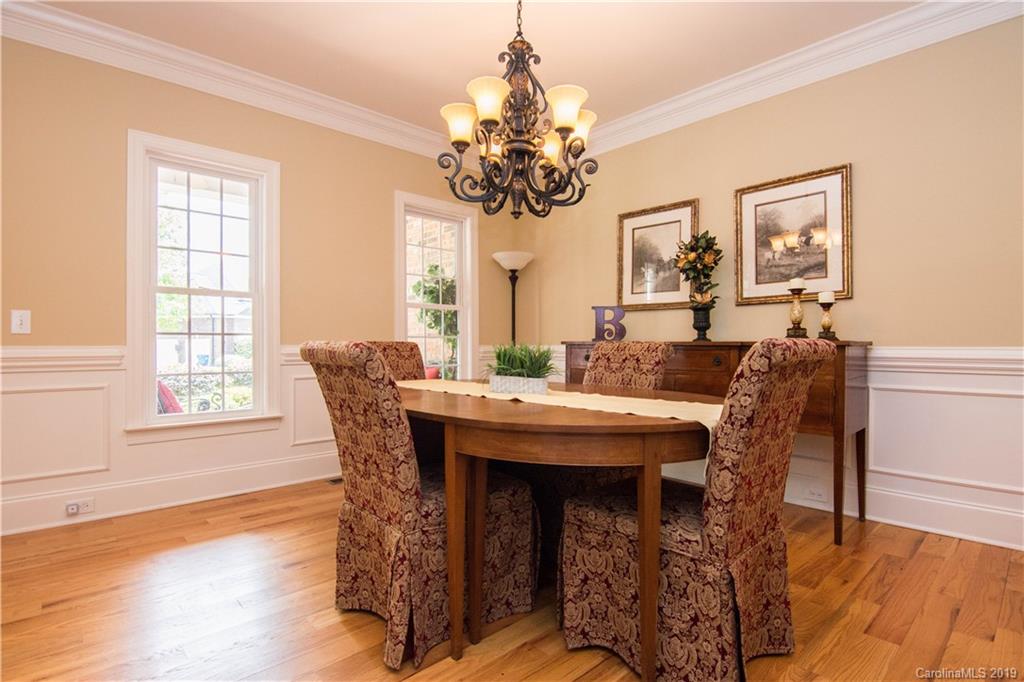 6695 Fox Ridge Circle Davidson, NC 28036 - Photo 8 of 42 a view of a dining room with furniture window and wooden floor