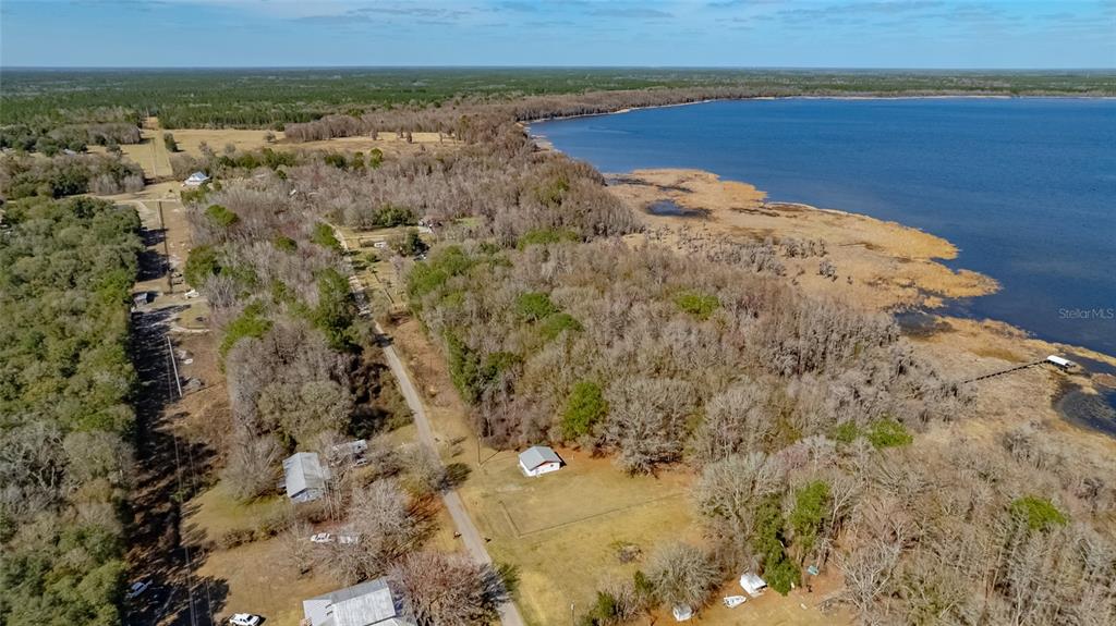 Southwest 136th Street Starke, FL 32091 - Photo 11 of 16 a view of a lake with a mountain in the background
