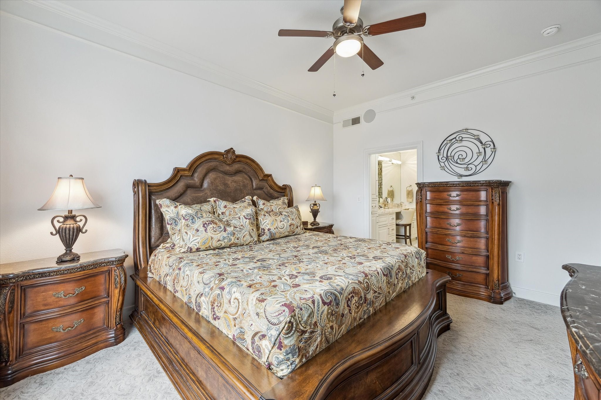 3333 Allen Parkway, Unit 602 Houston, TX 77019 - Photo 14 of 49 a bedroom with a bed and cabinets