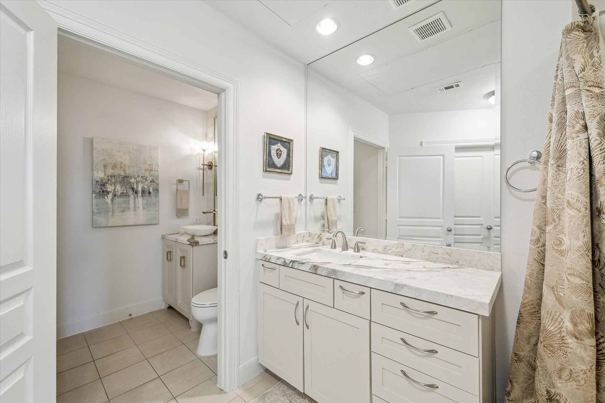 3333 Allen Parkway, Unit 602 Houston, TX 77019 - Photo 20 of 49 a spacious bathroom with a granite countertop sink mirror and toilet