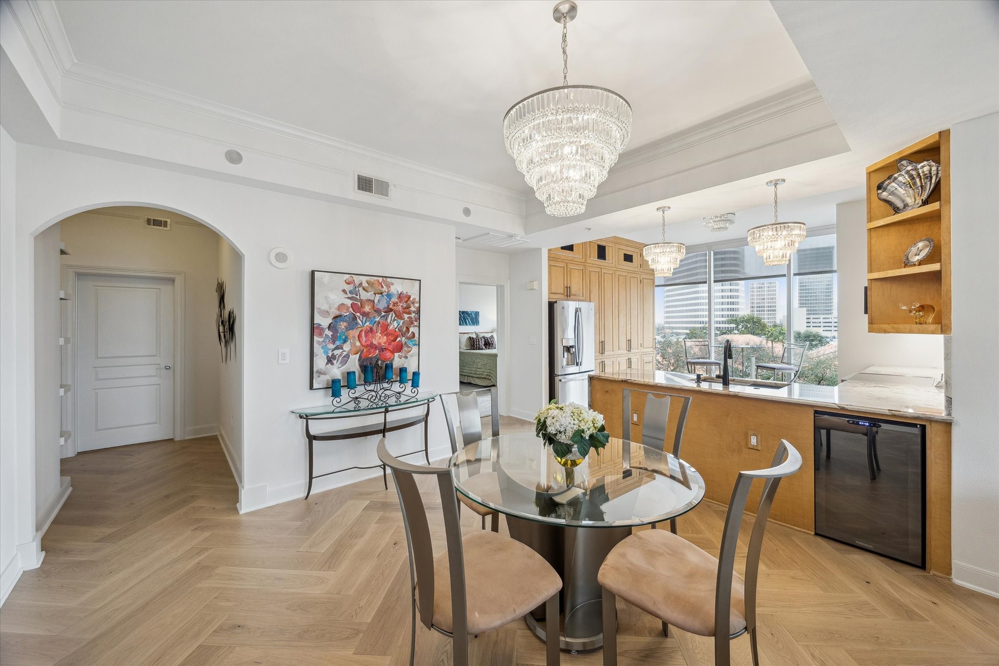 3333 Allen Parkway, Unit 602 Houston, TX 77019 - Photo 2 of 49 a view of a dining room with furniture wooden floor and chandelier