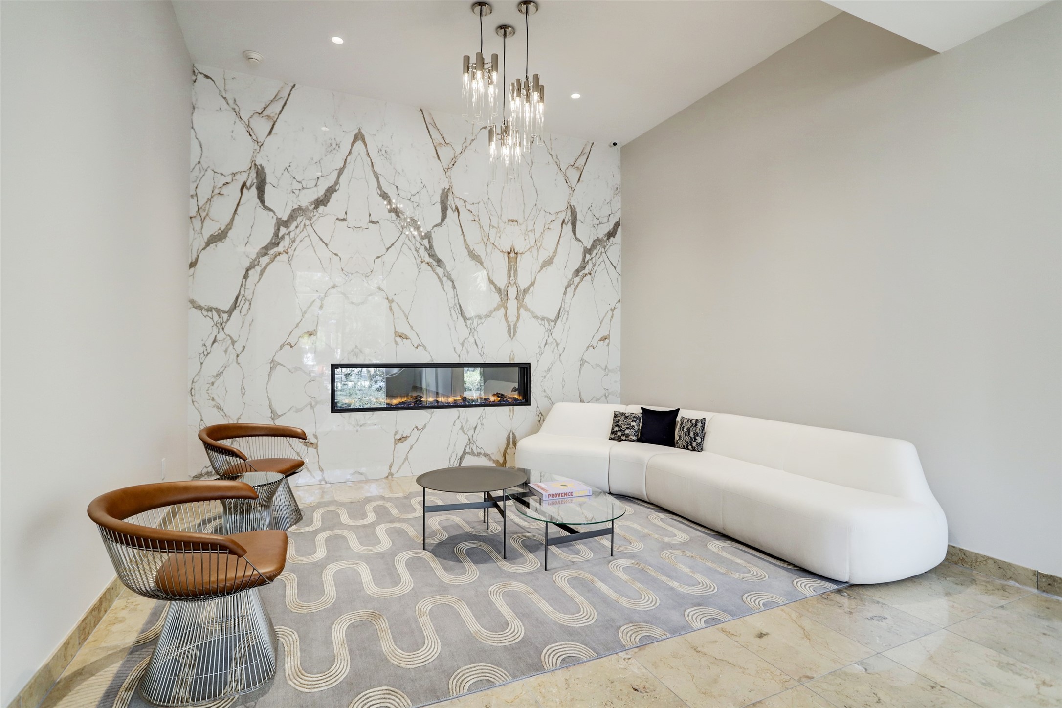 3333 Allen Parkway, Unit 602 Houston, TX 77019 - Photo 30 of 49 a living room with furniture and a chandelier