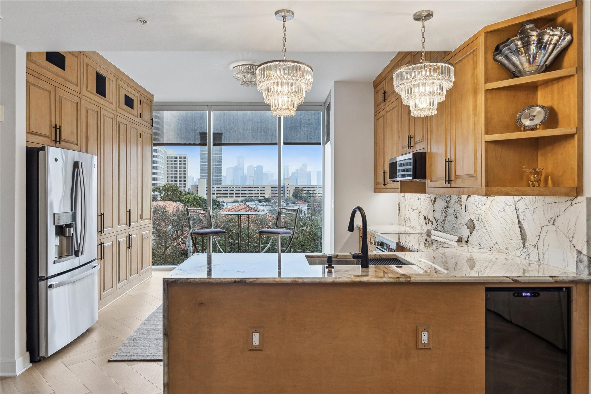 3333 Allen Parkway, Unit 602 Houston, TX 77019 - Photo 3 of 49 a view of a kitchen with granite countertop a sink stainless steel appliances and cabinets