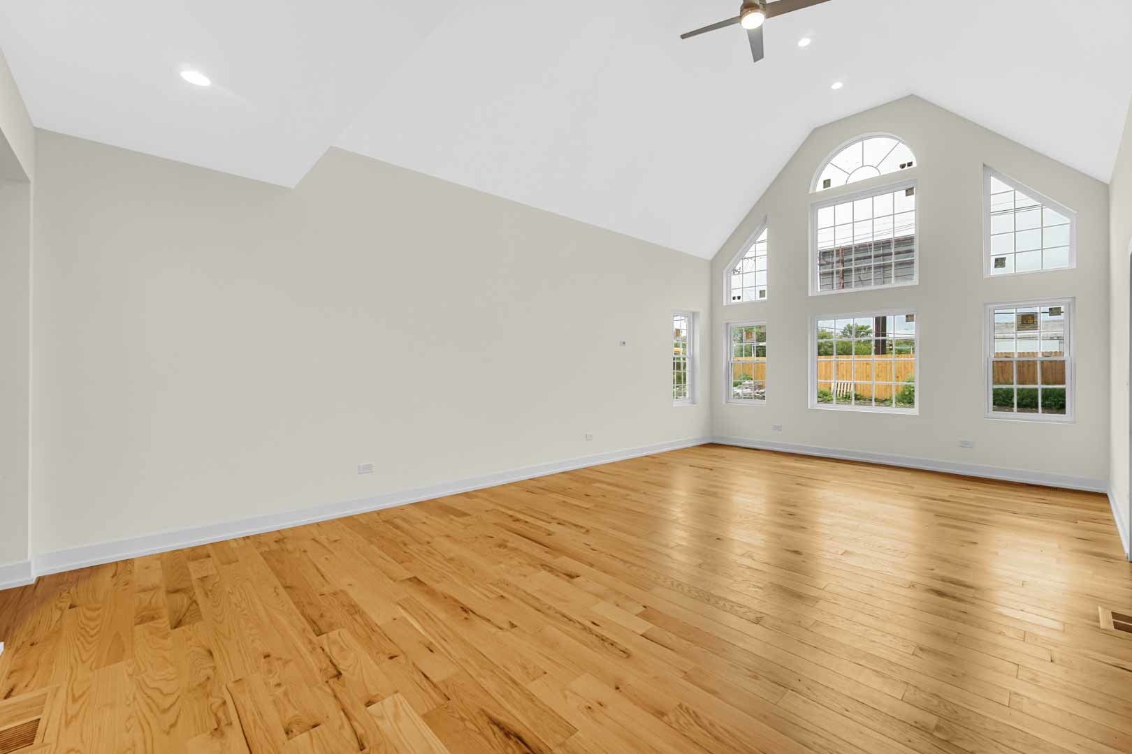 602 Glenshire Road Glenview, IL 60025 - Photo 20 of 98 an empty room with wooden floor cabinet and windows
