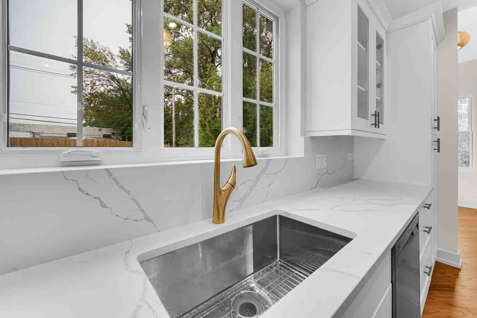602 Glenshire Road Glenview, IL 60025 - Photo 28 of 98 a kitchen with granite countertop a sink and a window