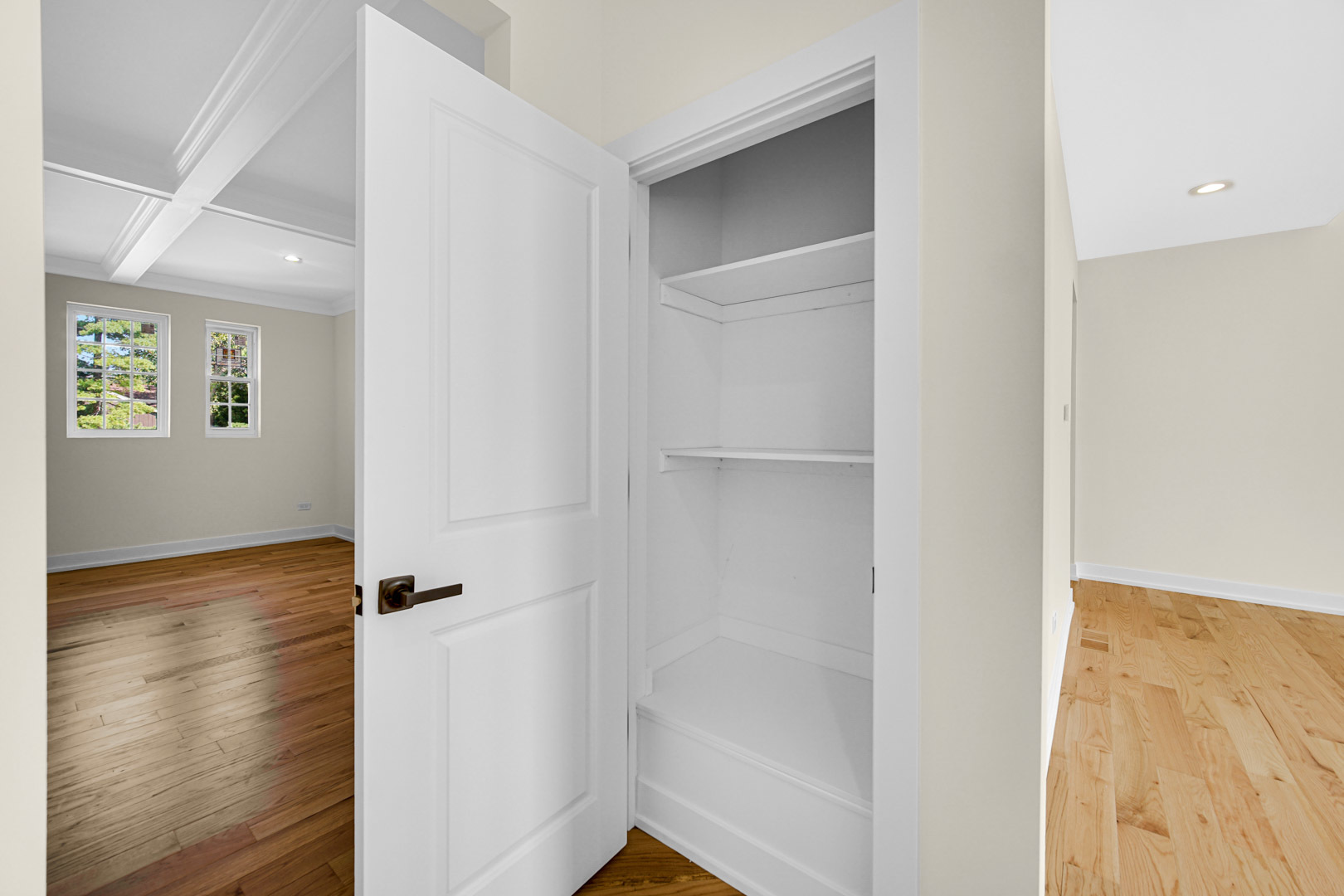 602 Glenshire Road Glenview, IL 60025 - Photo 35 of 98 a view of a hallway with wooden floor and closet