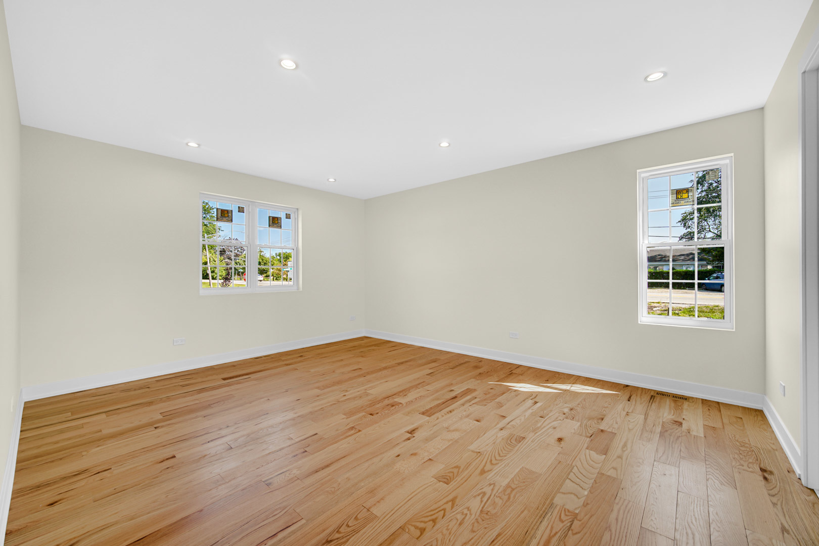 602 Glenshire Road Glenview, IL 60025 - Photo 49 of 98 a view of an empty room with wooden floor and a window