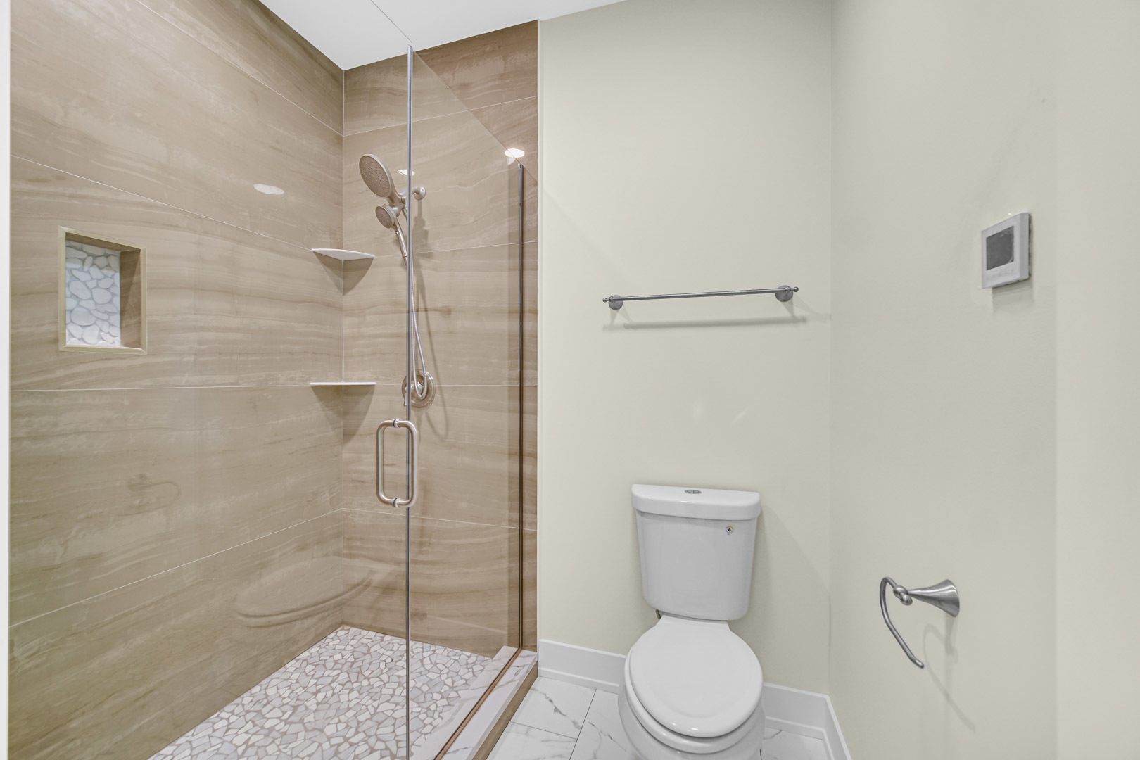 602 Glenshire Road Glenview, IL 60025 - Photo 54 of 98 a bathroom with a toilet and a shower