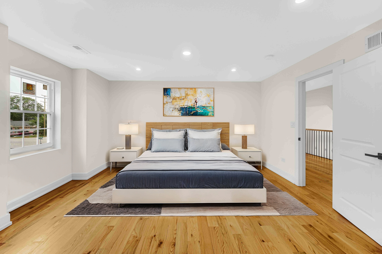 602 Glenshire Road Glenview, IL 60025 - Photo 60 of 98 a spacious bedroom with a bed and wooden floor