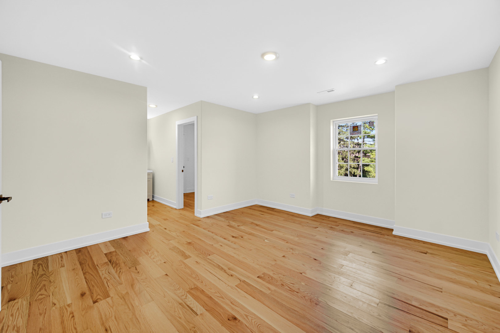 602 Glenshire Road Glenview, IL 60025 - Photo 62 of 98 a view of empty room with wooden floor and fan