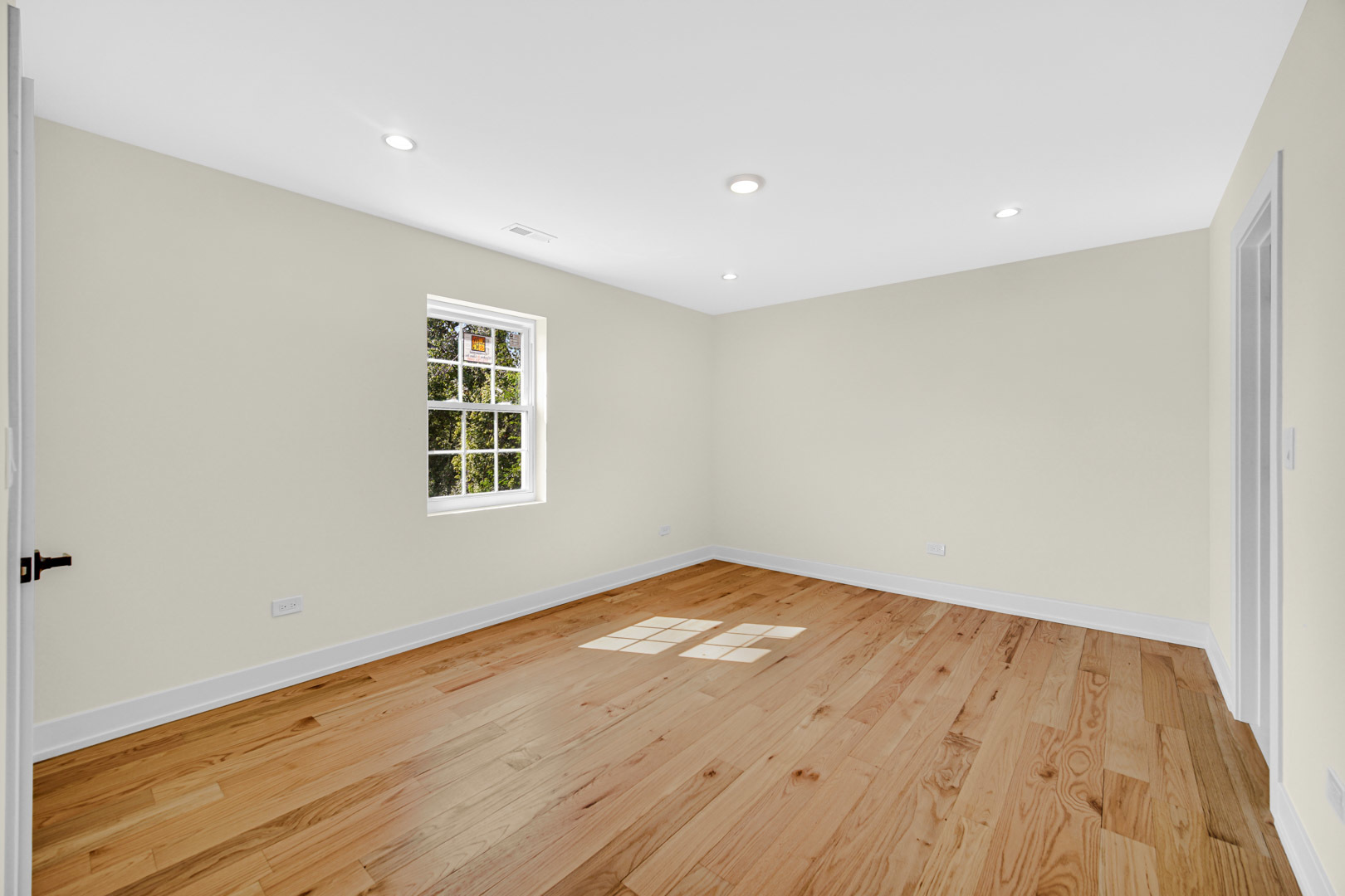 602 Glenshire Road Glenview, IL 60025 - Photo 68 of 98 a view of empty room with wooden floor and fan