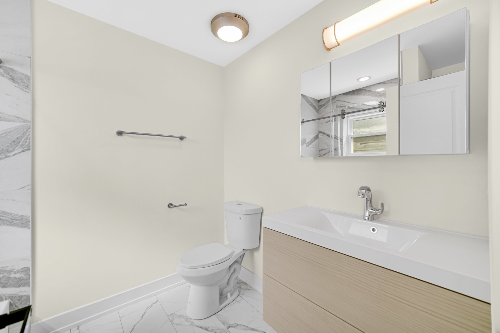 602 Glenshire Road Glenview, IL 60025 - Photo 75 of 98 a bathroom with a sink a toilet and shower