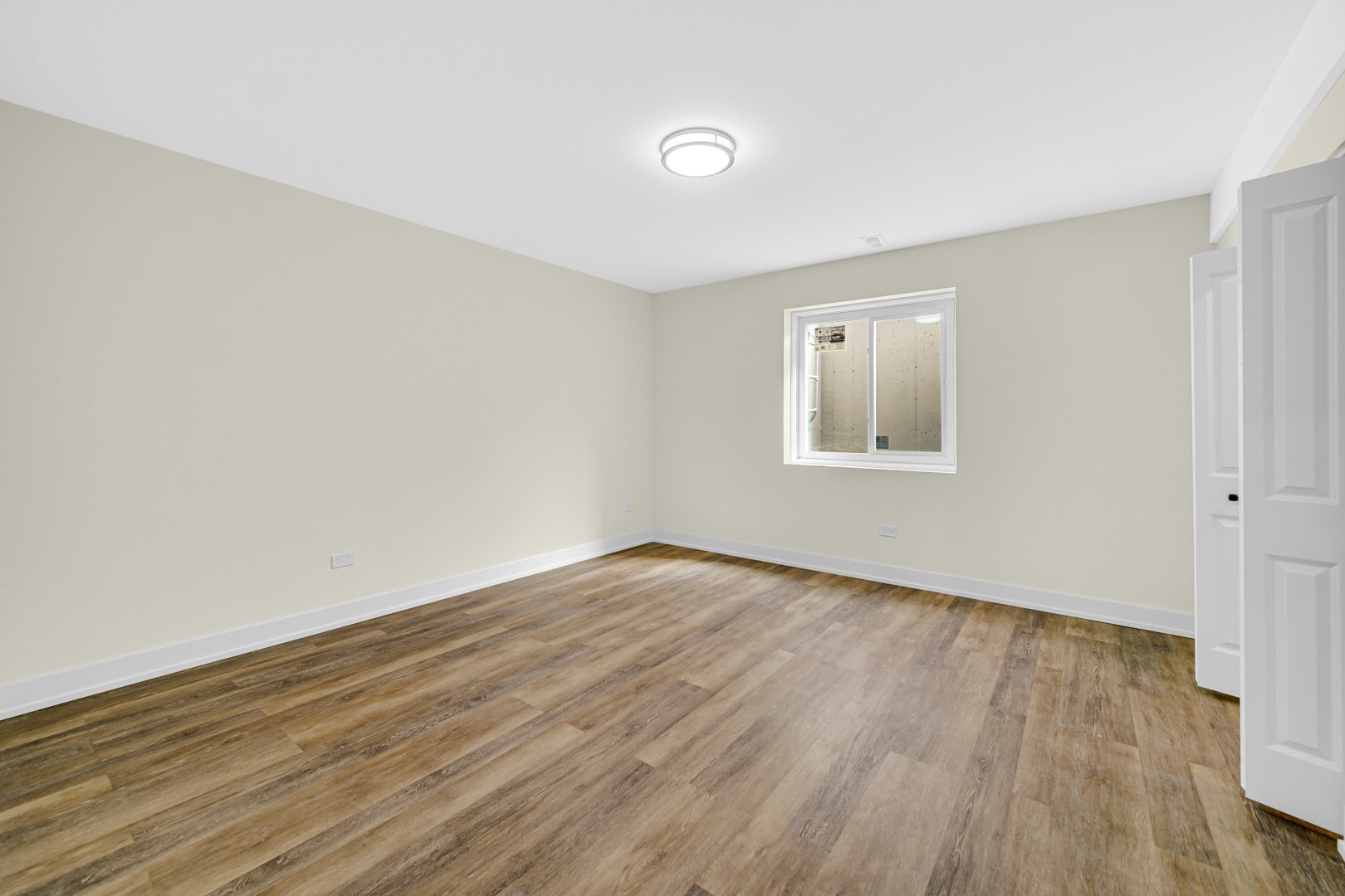 602 Glenshire Road Glenview, IL 60025 - Photo 88 of 98 a view of an empty room with wooden floor and a window