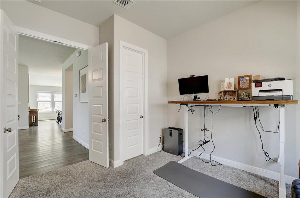 416 Peakside Circle Dripping Springs, TX 78620 - Photo 16 of 31 a view of a workspace with furniture