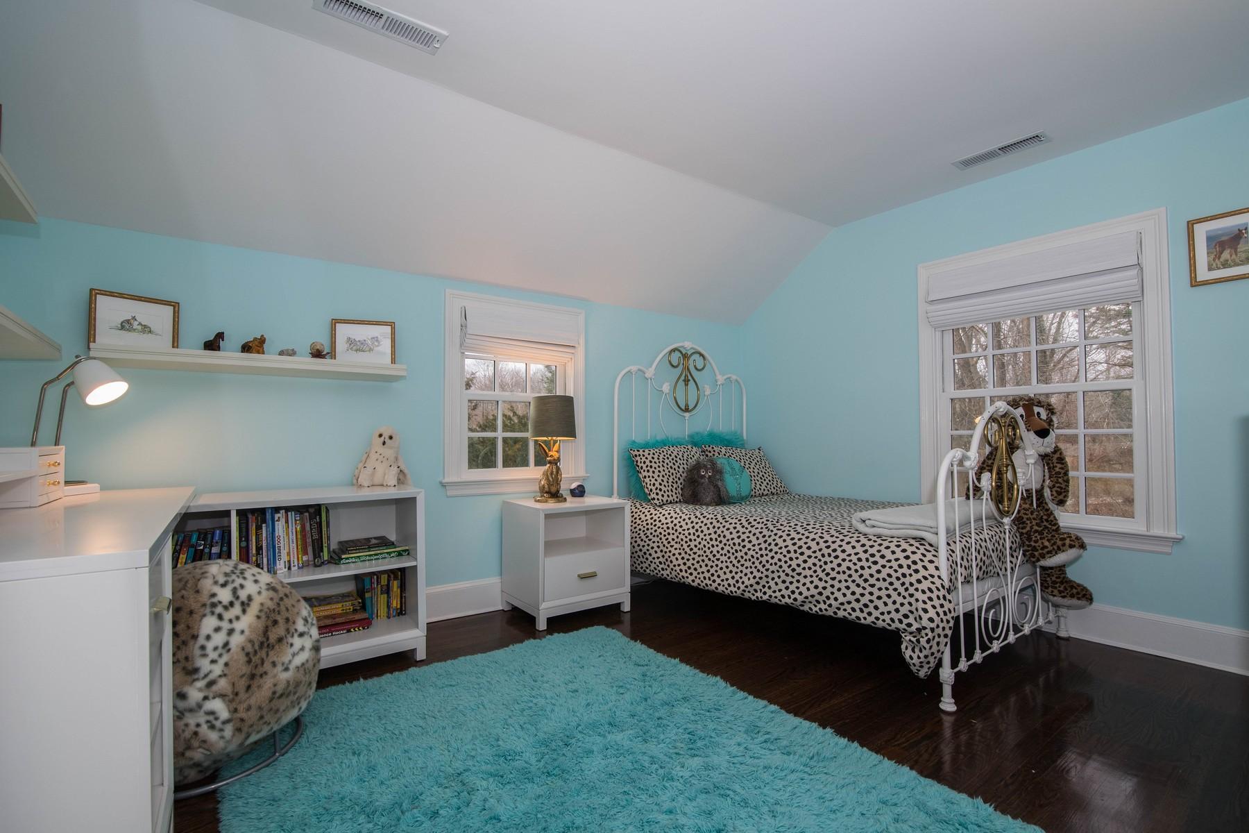 142 Brookside Road Darien, CT 06820 - Photo 17 of 25 a room with furniture and a window