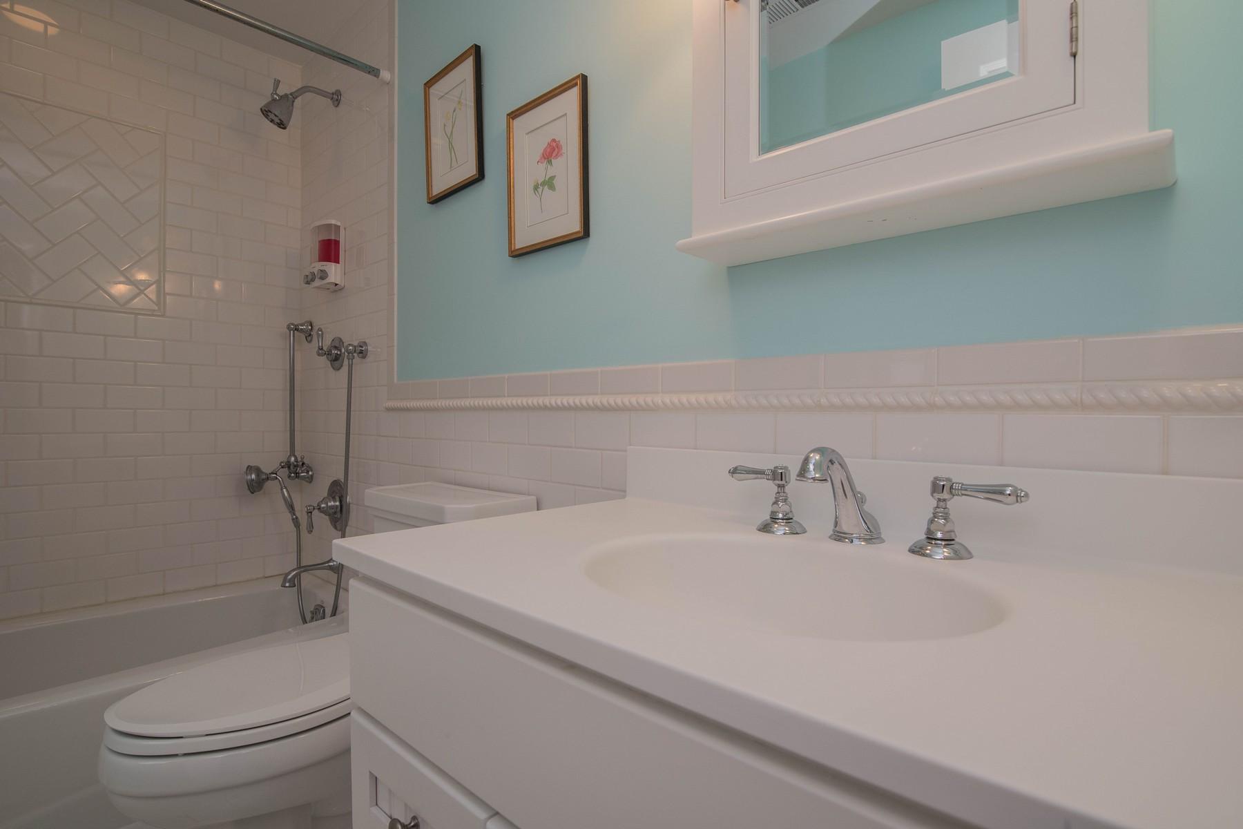 142 Brookside Road Darien, CT 06820 - Photo 18 of 25 a bathroom with a sink a toilet and shower