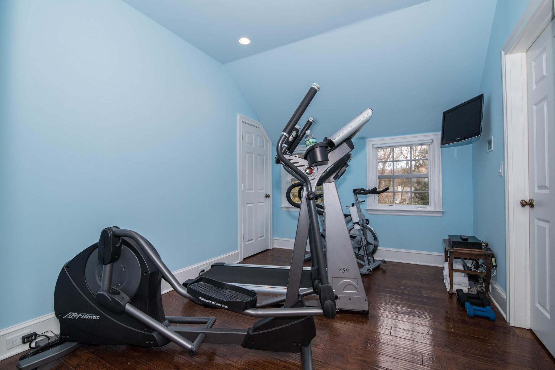 142 Brookside Road Darien, CT 06820 - Photo 20 of 25 a room with gym equipment