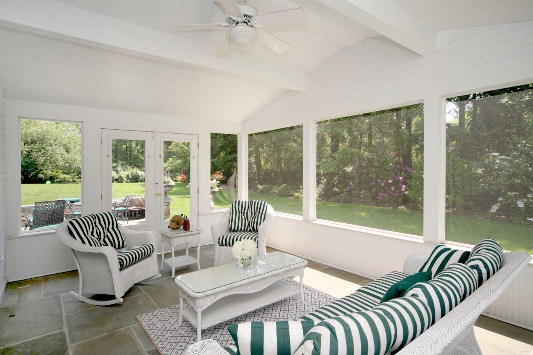 142 Brookside Road Darien, CT 06820 - Photo 6 of 25 a living room with furniture and a large window